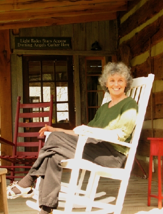 Barbara Napier of Snug Hollow Innkeeper Barbara Napier (on the cabin porch) is the perfect host and a fabulous cook.