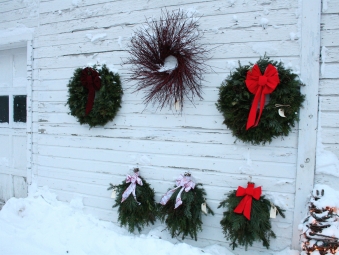 Wreaths for sale in the town of Egg Harbor were displayed on a historic garage.