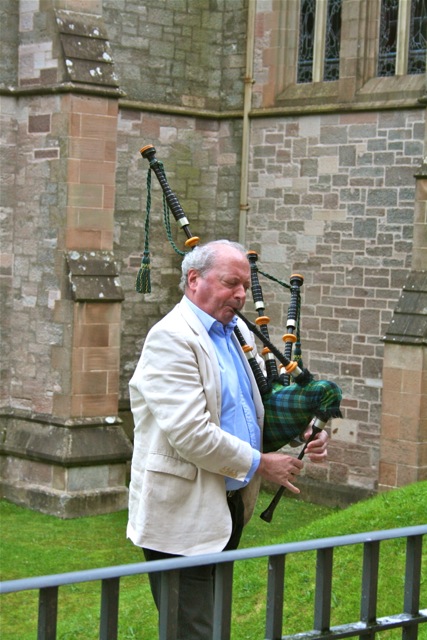 David Todd plays bagpipes at the College of the Holy Spirit. © Laurel Kallenbach
