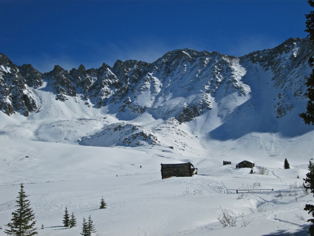 The jagged schist-rock ridge with 13,995-foot Mount Fletcher is a great spot for Telemark ski runs. ©Ken Aikin