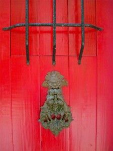 Brass knocker on a door ©Laurel Kallenbach