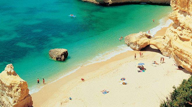 Portugal's Algarve Region: where Bela Seafood is caught and packaged. This is Marinha Beach, a popular tourist spot. Photo Turismo de Portugal