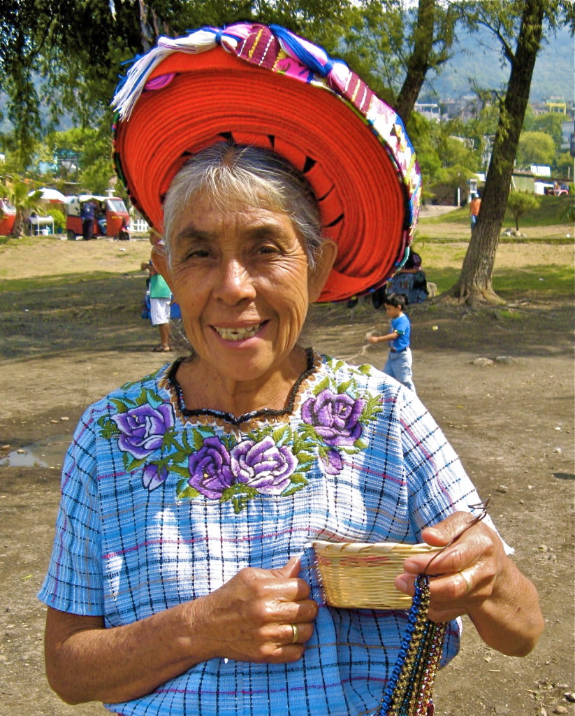 This woman, wearing a traditional Mayan hat, met our water taxi at the dock of the town of Santiago Atitlán. Widowed during the Guatemalan Civil War, she supports herself by selling her beadwork to tourists. © Laurel Kallenbach